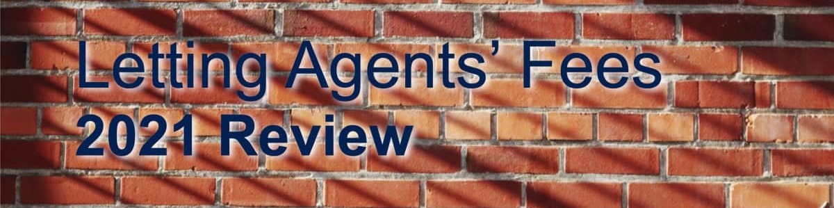 brick wall with lighting from left and Letting Agent's Fees 2021 Review